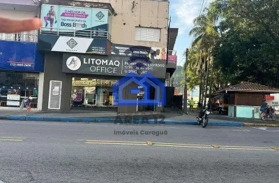 Ponto comercial no centro com 5  salas, sendo duas com banheiro, solário, cozinha, varanda, espaço