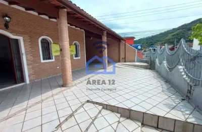 Casa à venda no centro em caraguatatuba, 4 dormitórios, sala ampla, garagem para 3 carros, churrasq