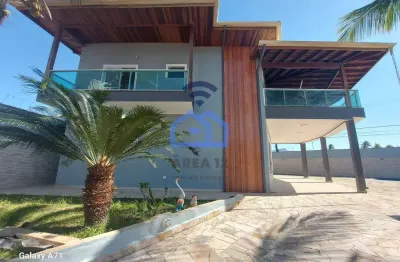 Lindíssimo sobrado com piscina e vista para o mar à venda no bairro praia das palmeiras em caraguat