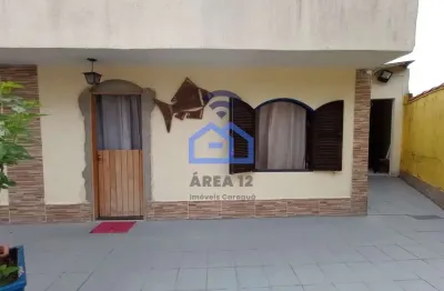 Casa à venda em condomínio no bairro martim de sá em caraguatatuba - com 2 dormitórios, sala e cozi