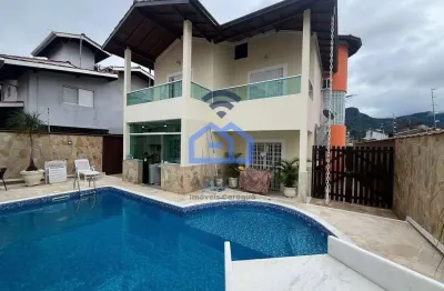 Casa à venda no bairro do indaiá em caraguatatuba, sp - com 2 suítes, sala e garagem com espaço par