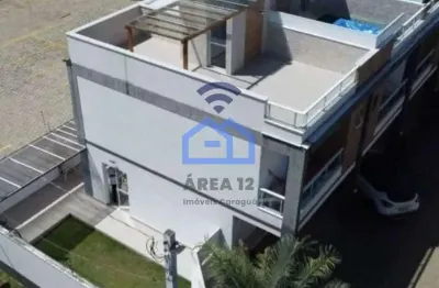 Sobrado triplex à venda no bairro do massaguaçu em caraguatatuba, sp - localizado a apenas 150m da