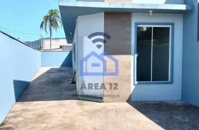 Casa à venda no bairro do golfinho em caraguatatuba, sp - viva confortavelmente com a sua família!
