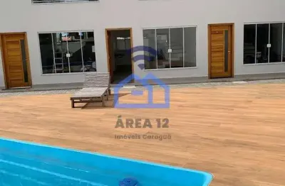 Sobrado novo à venda em condomínio com piscina, a apenas 300m da praia do massaguaçu em caraguatatu