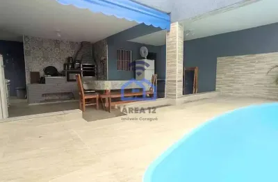 Casa com piscina e área gourmet à venda no bairro do indaiá em caraguatatuba, sp