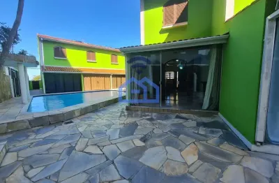 Sobrado em condomínio com vista mar à venda no bairro do indaiá em caraguatatuba, sp