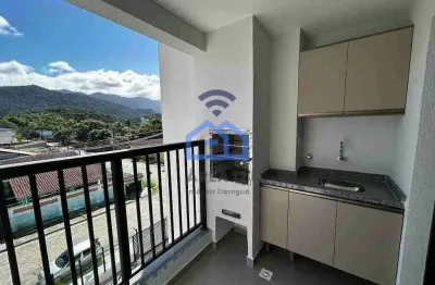 Apartamento novo na quadra da praia da martim de sá à venda em caraguatatuba, sp