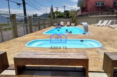 Maravilhoso apartamento frente mar à venda no bairro do porto novo em caraguatatuba, sp