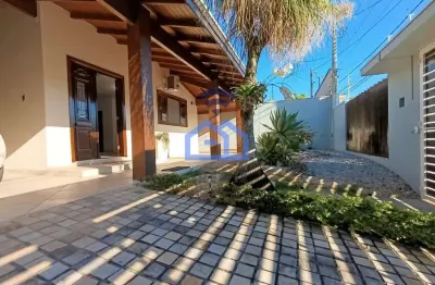 Casa à venda no bairro indaiá em caraguatatuba, sp com 3 dormitórios sendo 2 suítes, piscina e área