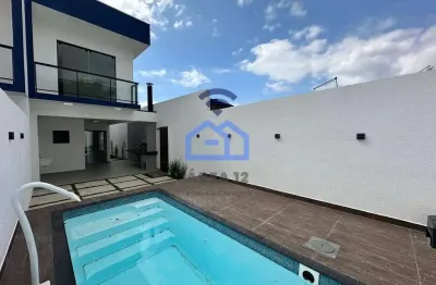 Casa à venda com piscina, espaço gourmet e 3 dormitórios, jardim porto novo, caraguatatuba, sp