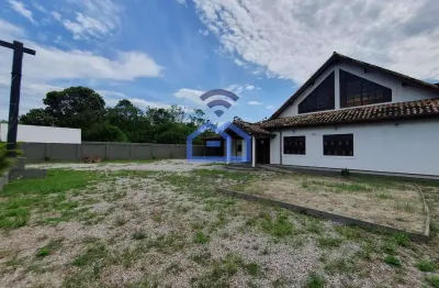 Casa comercial com 4 salas para alugar no Travessão, Caraguatatuba 