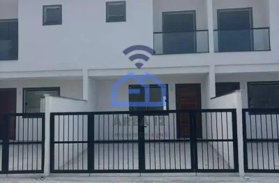 Sobrado geminado à venda no bairro massaguaçu em caraguatatuba, sp com 2 suítes 2 vagas de garagem