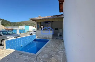 Casa em condomínio fechado com 2 quartos para alugar no Martim de Sá, Caraguatatuba 