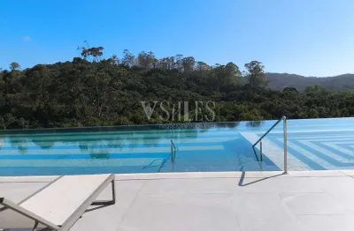 Vista panoramica da sacada gourmet com acesso ao living e suite