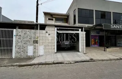 Casa térrea com segunda moradia superiir à venda no bairro santa regina-itajaí