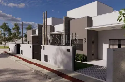 Excelente geminado com fino acabamento meia praia em navegantes