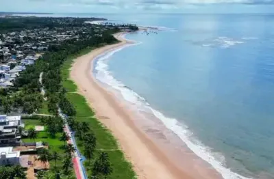 Terreno em condomínio fechado à venda na rua arraia, guarajuba, camaçari por r$ 1.550.000