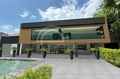 Casa de luxo na barra da tijuca: 5 quartos, 5 suítes, 7 banheiros, 4 vagas de garagem, 600m². confira!