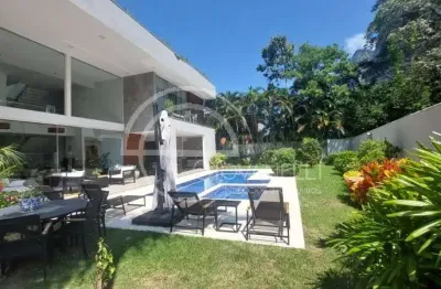 Luxuosa casa de 5 suítes em são conrado - rio de janeiro-rj: 911m² de arquitetura impecável e 4 vagas na garagem!