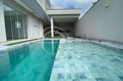Impecável casa em condomínio à venda - 4 quartos, 4 suítes, 6 banheiros, 2 vagas de garagem, 220m²