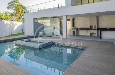 Casa contemporânea com vista para pedra da gávea, 683m², 5 suítes, piscina, sauna, espaço gourmet, localizada no melhor condomínio do itanhangá.
