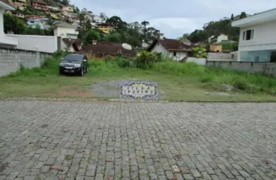 Terreno em condomínio fechado à venda na rua oscar josé da silva, pimenteiras, teresópolis por r$ 600.000