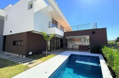 Casa com 3 dormitórios à venda, 310 m² por r$ 2.850.000,00 - condomínio tabapuã - valinhos/sp