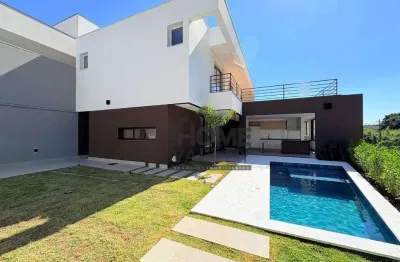 Casa com 3 dormitórios à venda, 310 m² por r$ 2.850.000,00 - condomínio tabapuã - valinhos/sp