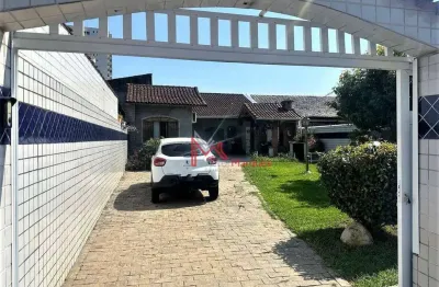 Casa isolada com 2 dormitórios, sendo 1 suíte à venda, 58 m² por r$ 1.010.000 - canto do forte - praia grande/sp