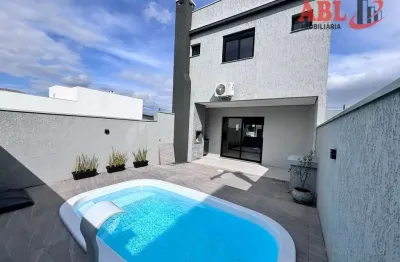 Sobrado 3 dormitórios 1 suíte com sacada e churrasqueira em condomínio em gravataí