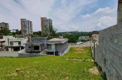 Venda de terreno no aruja ville ii, em arujá/sp, 459m² em aclive, frente para quadra poliesportiva e vista incrível de área verde! consulte-nos.