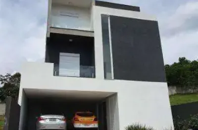 Venda casa condomínio arujá ville ii excelente imóvel com a/t 432m² a/c 330m² distribuídos em 3 suítes sendo 1 suíte máster com closet, banheira de hi