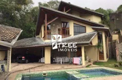 Venda de casa no condomínio hills i e ii em arujá/sp, 1000m² mobiliado c/ 5 suítes, ambientes amplos, piscina, churrasqueira e 10 vagas. consulte-nos.
