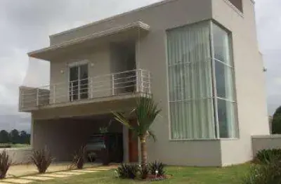 Venda de casa no condomínio real park, em arujá/sp, 235m² com 3 suítes, 1 suíte master, área gourmet com churrasqueira e garagem coberta. consulte-nos