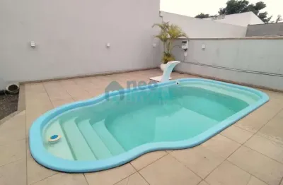 Casa com 4 quartos à venda na rua flórida, passa vinte, palhoça, 160 m2 por r$ 990.000