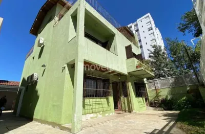 Casa com 6 quartos à venda na rua inhanduí, 193, cristal, porto alegre por r$ 1.200.000
