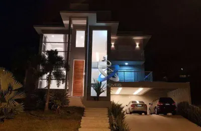 Sobrado com 4 dormitórios à venda, 345 m² por r$ 5.300.000,00 - condomínio reserva do paratehy - são josé dos campos/sp