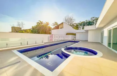 Casa térrea com 4 suítes à venda no condomínio estância marambaia em vinhedo/sp