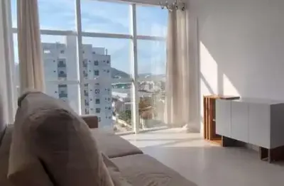 Apartamento semi mobiliado com dois dormitórios sendo uma suíte