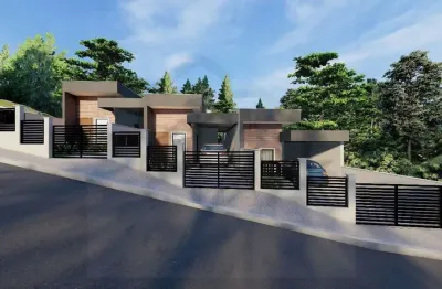 Casa térrea de dois dormitórios moderna, segura e bem localizada