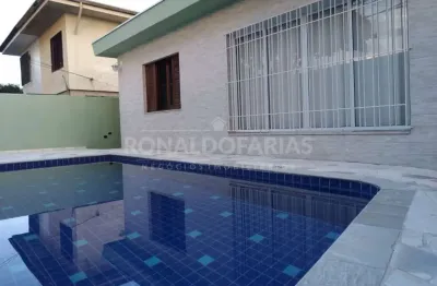 Casa térrea a venda, com 3 dormitórios sendo 1 suíte 4 vagas na garagem