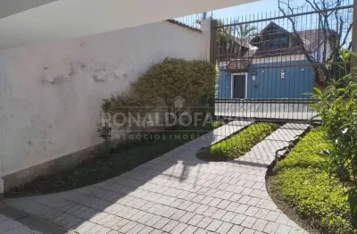 Sobrado  venda sendo 4 dormitorio com suite , sala ampla , escritorio , piscina churasqueira .