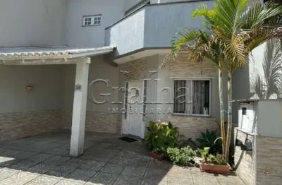 Casa em condomínio fechado com 3 quartos à venda na rua deputado hugo mardini, 1780, passo das pedras, porto alegre por r$ 699.000