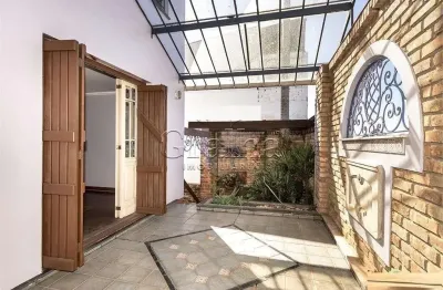 Casa com 4 quartos à venda na rua silveiro, 1340, menino deus, porto alegre por r$ 1.200.000