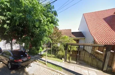 Casa com 4 quartos à venda na rua alcebíades antônio dos santos, 513, nonoai, porto alegre por r$ 980.000