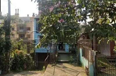 Casa com 4 quartos à venda na rua eudoro berlink, 946, auxiliadora, porto alegre por r$ 1.200.000
