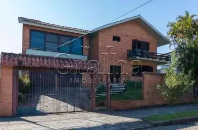 Casa com 3 quartos à venda na rua manauê, 60, vila assunção, porto alegre por r$ 1.190.000