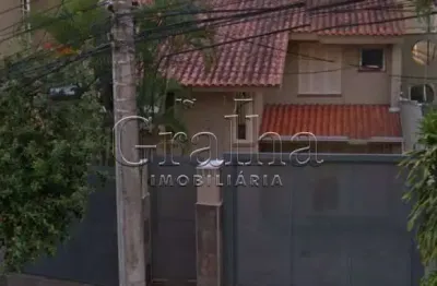 Casa com 4 quartos à venda na rua miguel couto, 890, menino deus, porto alegre por r$ 1.100.000