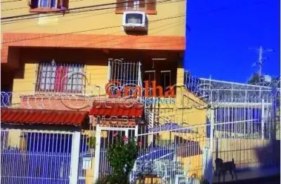 Casa com 3 quartos à venda na rua professor joaquim louzada, 104, tristeza, porto alegre por r$ 550.000