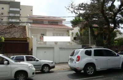 Casa com 4 quartos à venda na rua américo vespucio, 374, higienópolis, porto alegre por r$ 1.500.000